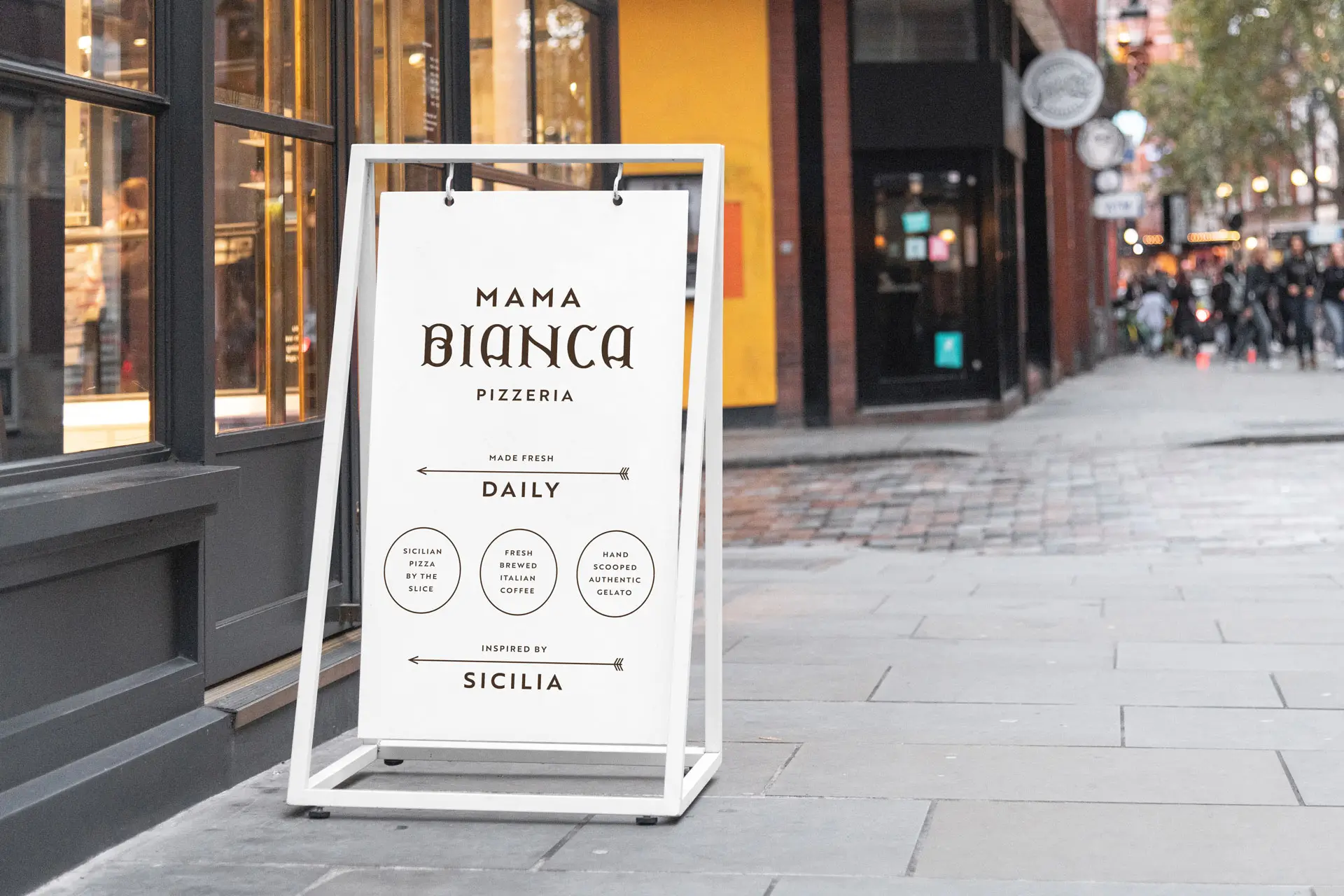 A vintage image of a Sicilian pizza shop in Palermo served as the inspiration for the custom designed typography for the word "Bianca."